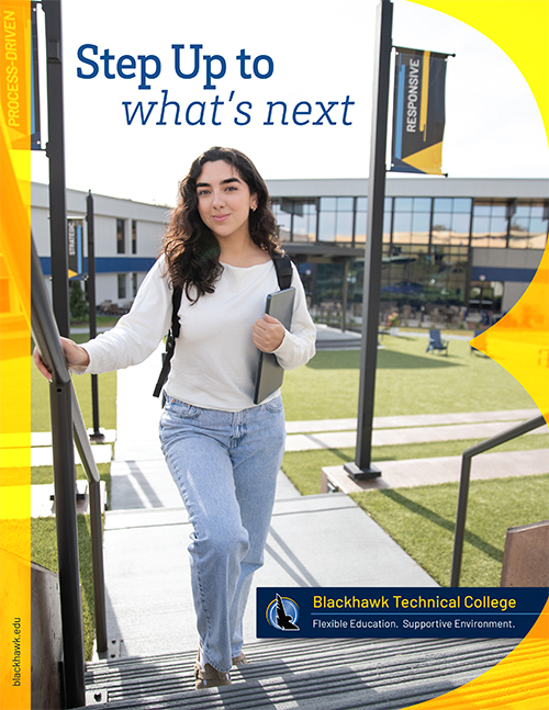 Female student standing at the top of a staircase in the courtyard at Blackhawk's Beloit-Janesville Campus